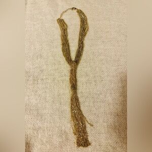 👉 Gold-Tone Chain Tassel Necklace – Statement Fringe Style